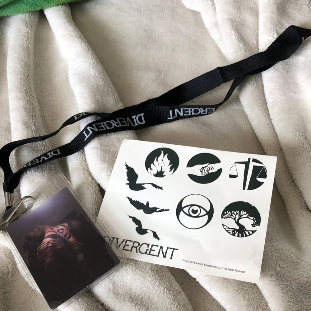 Divergent lanyard and tattoos